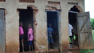 Pupils and teachers forced to share pit-latrine at Mbale city school